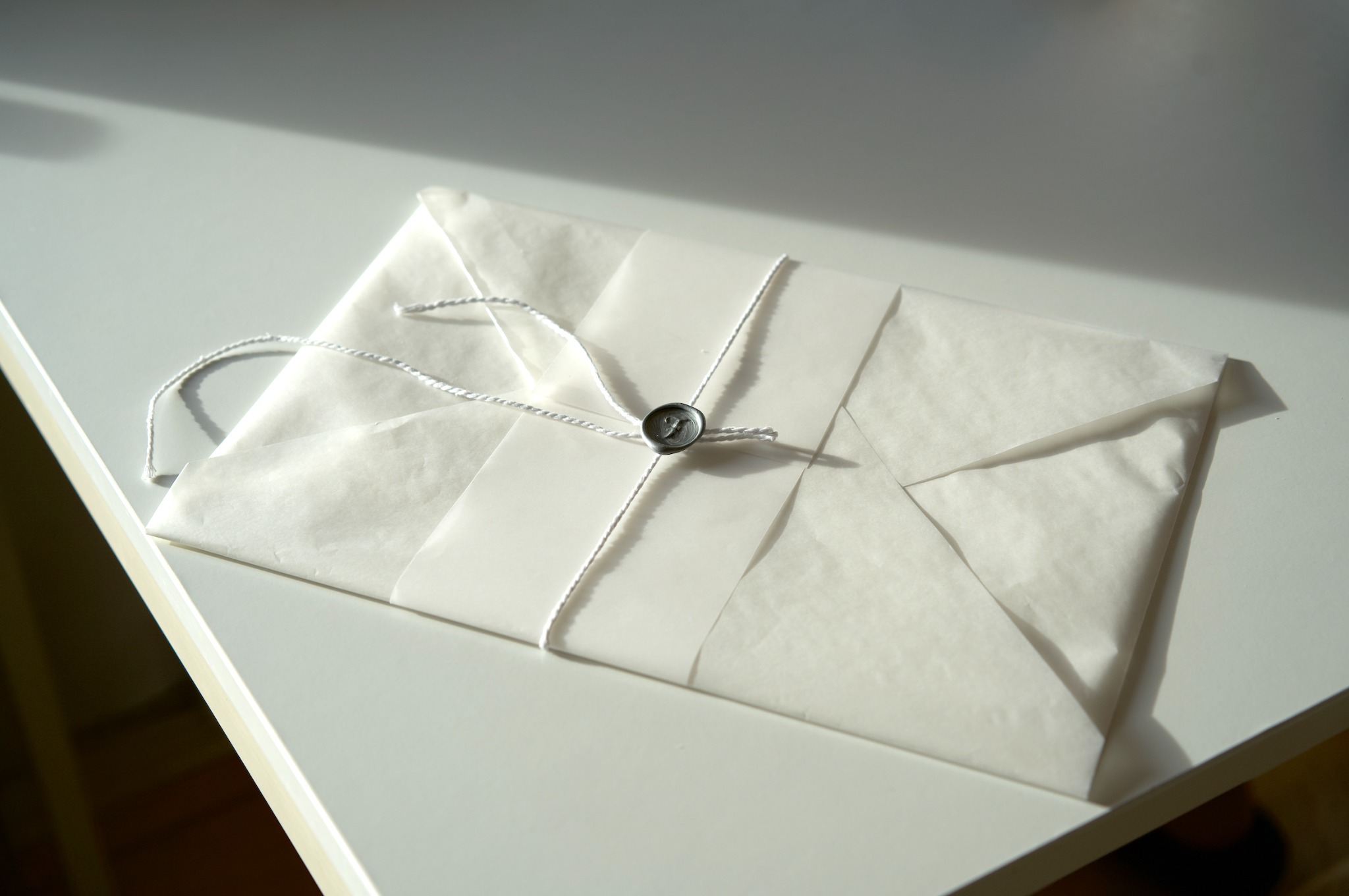 Wrapped Amalfi watercolour paper sample pack with white cord and wax seal